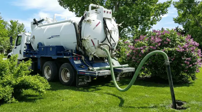 Professional vacuum truck performing residential drainage and septic maintenance in Myrtle Beach, SC